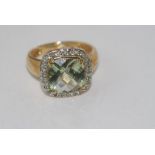 Yellow gold and green amethyst ring marked 10K ,weight: approx 3.5 grams, size: N-O/7