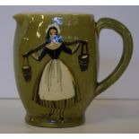 Martin Boyd Australian pottery jug decorated with milk lady to one side and the other milk