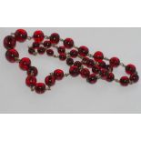 Cherry amber necklace with gold plated connectors, size: approx 64cm length
