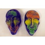 Two Kosta Boda mask art glass sculptures signed by Kjell Engman, 10cm high