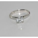 Platinum and diamond (1.02) solitaire ring Colour F, clarity P-1, weight: 4.8 grams, size: K-L/5,