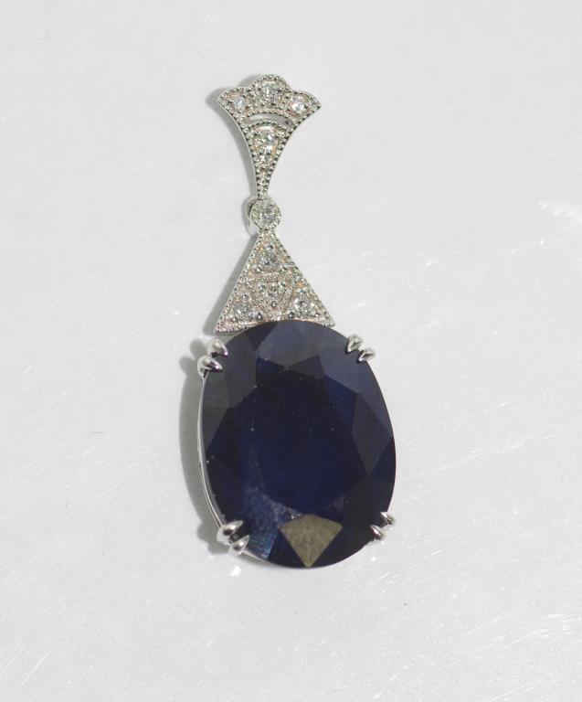 18ct white gold, sapphire (12.13ct) pendant with diamonds (11pts), weight: approx 4.24 grams,