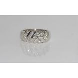 18ct white gold and diamond ring set with 15 brilliant cut diamonds in a diagonal pattern TDW= 1.