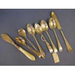 Six Georgian and later teaspoons together with a Birmingham 1881 MOP butter knife and Sheffield