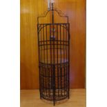 Wrought iron wine rack cabinet with glass top, 190 cm high, 59 cm diameter approx.