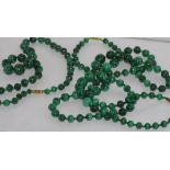 Three good malachite and green bead necklaces