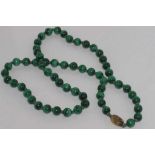 Individually knotted malachite necklace with silver gilt clasp