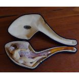 Carved meerschaum and amber pipe (cased) in the form of a naked woman.