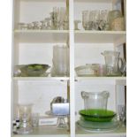 One shelf and two cupboards of vintage glass ware including jugs, serving bowls etc