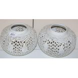 Two Chinese pierced white pottery vases