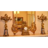 French ormolu and blue porcelain clock garniture Mid 19th century. the ormolu case with three