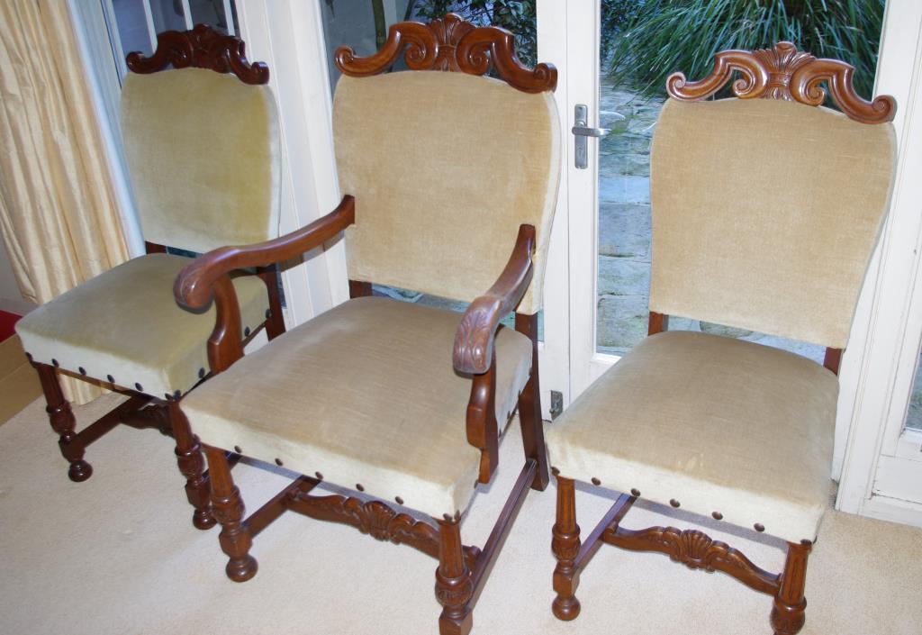 Antique style walnut dining chairs by Edward Hill, pair of carvers and ten dining chairs (3 shown)