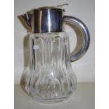 Large cut crystal and silver plate water jug with internal lid.