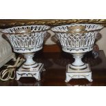 Pair of European porcelain glazed urns