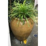 Large brown garden pot with plant