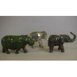 Three various animal figures to include hardstone hippopotamus and elephant and a sliver plate