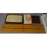 Mahjong game set with bone playing pieces, 4 playing racks and instructions