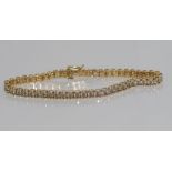 9ct yellow gold and diamond bracelet weight: approx 11.3 grams, size: approx 20.5 cm