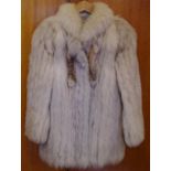 Fawn colour fox fur jacket with roll collar and hook fastening, satin lined