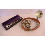 Vintage medical headlight lamp together with a cased Polar planimeter Stanley Great Turnstile