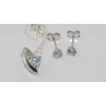 Sterling silver, blue topaz & diamond set comprising pendant and necklace with matching earrings