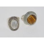 Tiger's eye and Mother of pearl rings marked 925 Sizes: S-T/9, Q-R/8