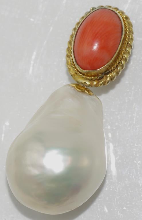 South sea baroque pearl pendant with coral and gilt fittings and a 9ct gold bale