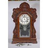 Ansonia cottage clock with 8 day striking movement, key and pendulum included