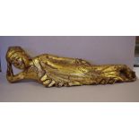 Large carved gilt timber deity 70cm long approx.
