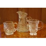 Large 19th century cut crystal jug together with 2 good cut crystal jugs,32cm high