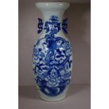 Antique Chinese blue and white vase decorated with a dragon and flowers. 56cm high