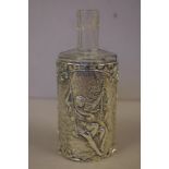 Victorian sterling silver perfume bottle sleeve decorated with a scene of children playing on a