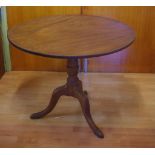 Victorian cedar pedestal table with round tilt top supported by a turned column and 3 legs, 88cm