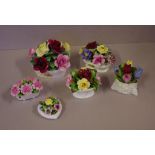 Six floral encrusted china ornaments to include Aynsley and Coalport