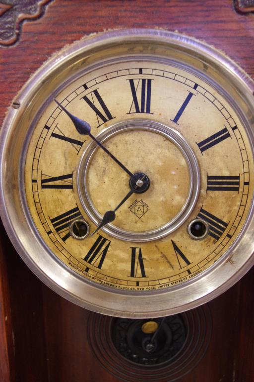 Antique Ansonia cottage clock with eight day striking movement, in ornate oak case, key and pendulum - Image 2 of 2