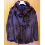 Saga Scandinavian chocolate mink jacket with hidden side pockets and hook fastening