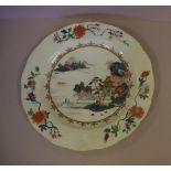 19th century Chinese porcelain charger decorated with multi coloured scene of a pagoda on