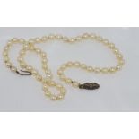 Mikimoto pearl necklace with silver Mikimoto clasp (missing pearl), size: approx 46cm