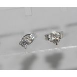 9ct white gold diamond studs each diamond 4 claw set, total = 0.20cts, H/Si 2