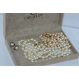 Two costume necklaces and earrings in Oroton box