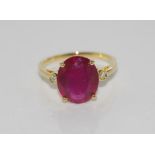18ct yellow gold, ruby and diamond ring ruby = 5.24cts, 2 diamonds = .04ct, weight: approx 3.3