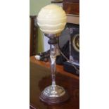 Art Deco chrome electric 'Diana' lamp with round cream coloured glass shade, 51cm high