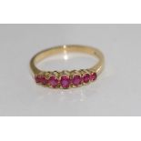 Hallmarked 9ct gold and ruby dress ring weight: approx 2.3 grams, size: O-P/7