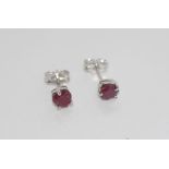 Sterling silver and ruby studs
