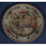 Good 18th Century Chinese export plate decorated with village scene.23cm diameter, fritting to