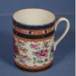 Early 19th century Chinese export ware tankard decorated with pink flowers.