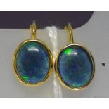 Opal and silver gilt earrings hinged with screw fittings
