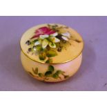 Royal Worcester blush ivory trinket box hand decorated, 6.5cm diameter approx.