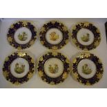 Set of 6 Daniel hand painted dessert plates with blue and yellow borders, decorated with central