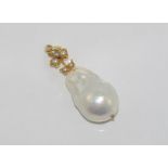 Baroque pearl pendant with 14ct gold & seed pearl bale (tested as 14ct but unmarked)
